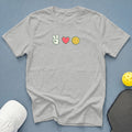 Light grey t-shirt with peace sign, heart, and pickleball graphic.