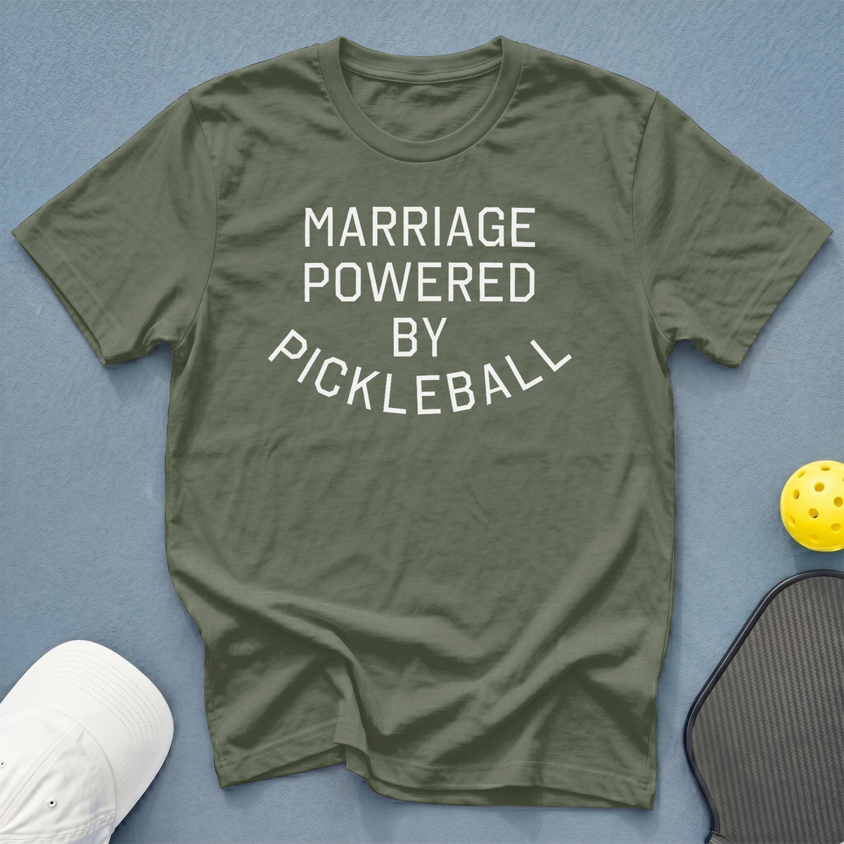 Green t-shirt with white text "MARRIAGE POWERED BY PICKLEBALL".