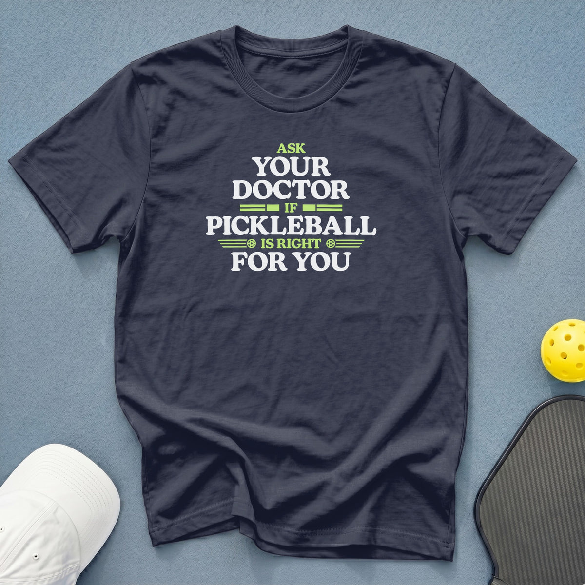 Dark blue t-shirt with "Ask your doctor if pickleball is right for you" text.