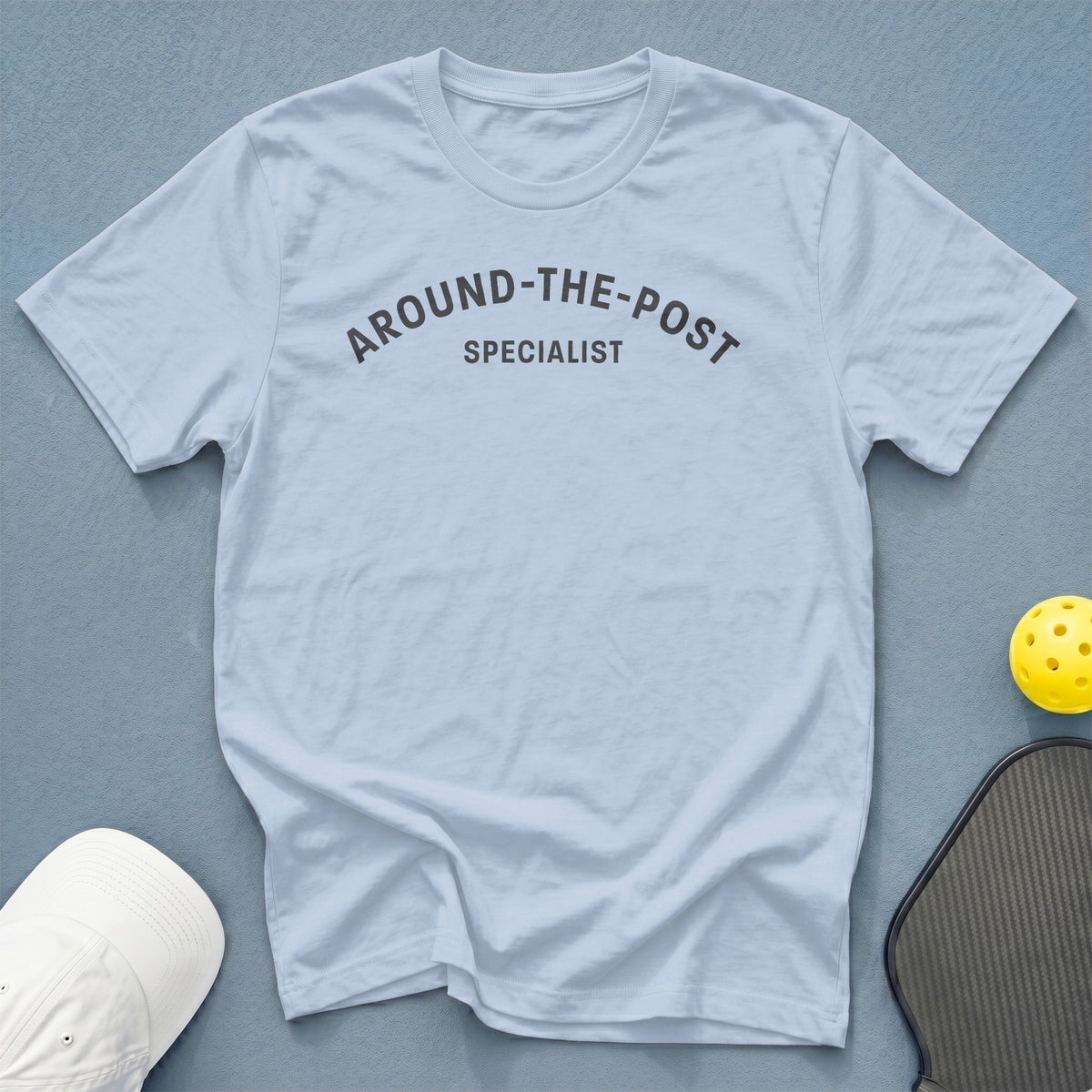 Light blue t-shirt with "AROUND-THE-POST SPECIALIST" text.