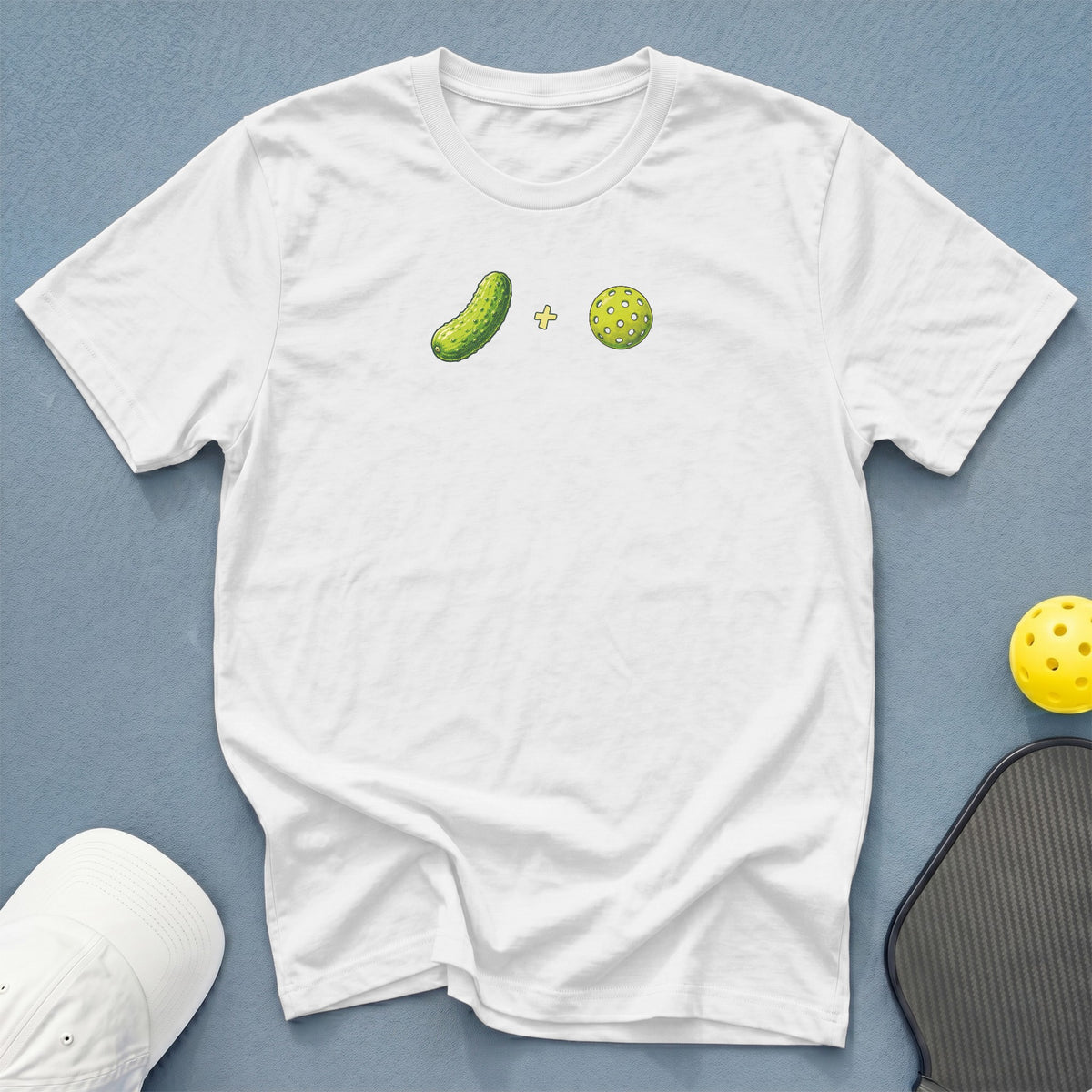 White t-shirt with a pickle and pickleball graphic.