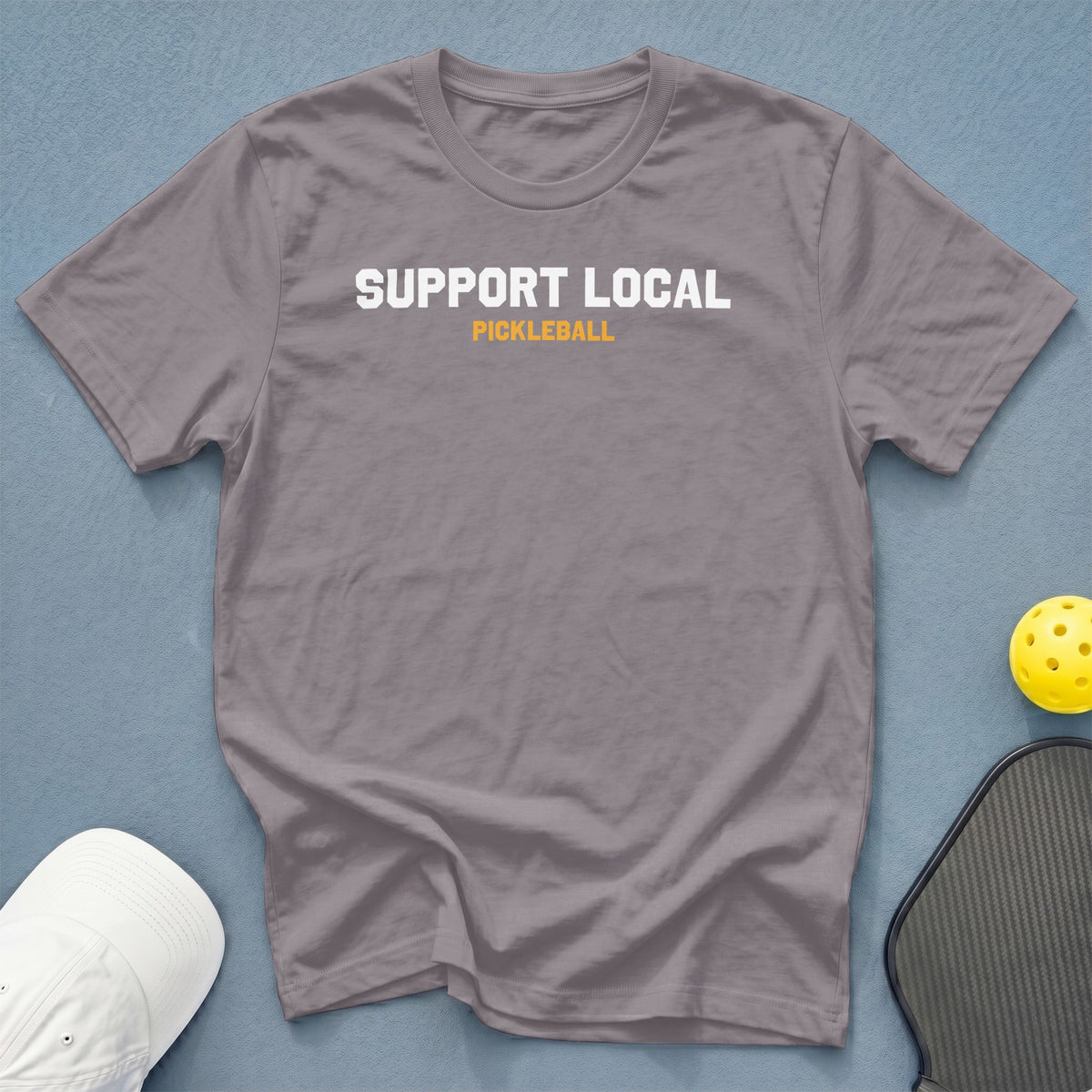 Grey t-shirt with white "SUPPORT LOCAL" and orange "PICKLEBALL" text.