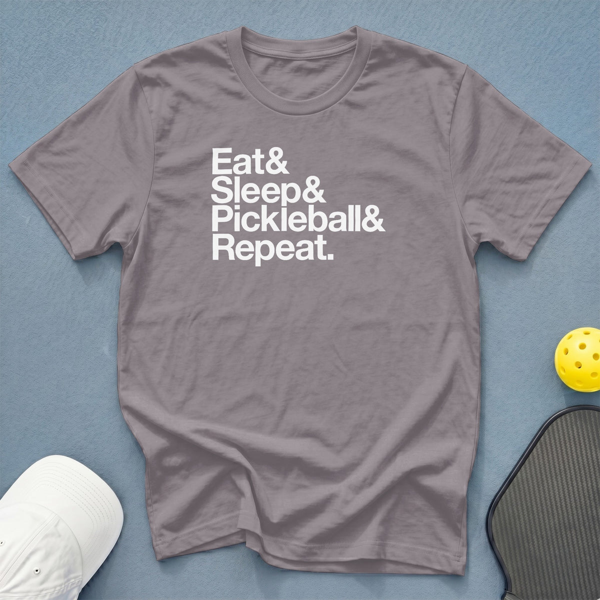 Grey t-shirt with white text: Eat & Sleep & Pickleball & Repeat.