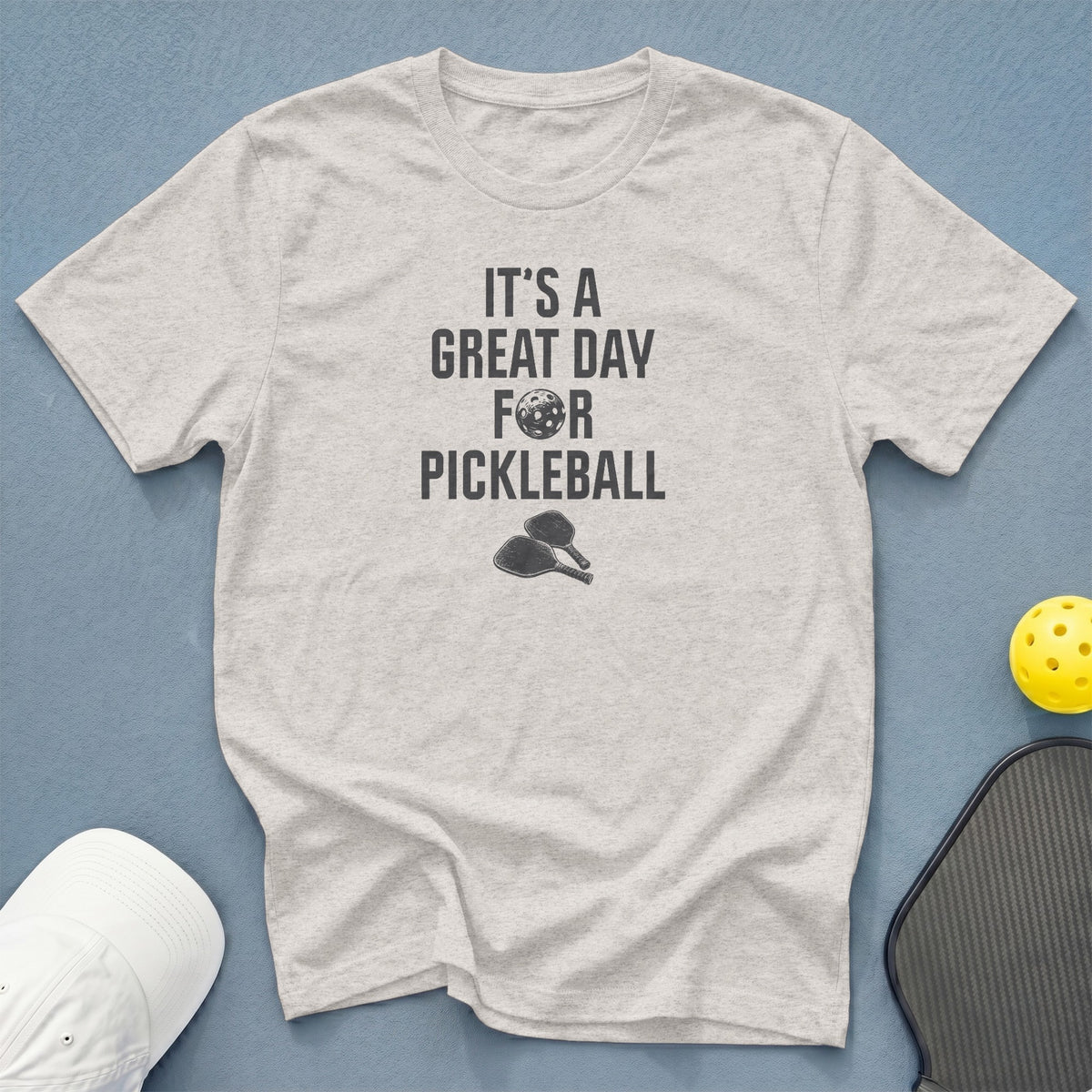 Light grey t-shirt with "It's a great day for pickleball" text and graphics.