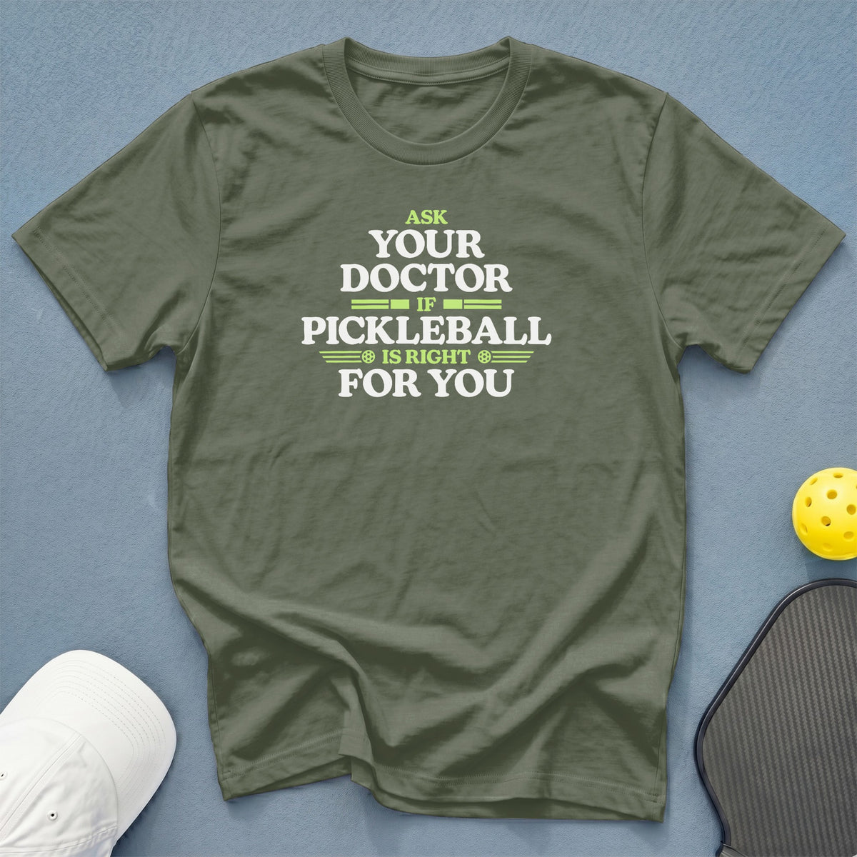 Olive green t-shirt with "Ask Your Doctor If Pickleball Is Right For You" text.