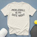 Cream t-shirt with "PICKLEBALL IS MY DATE NIGHT" text.