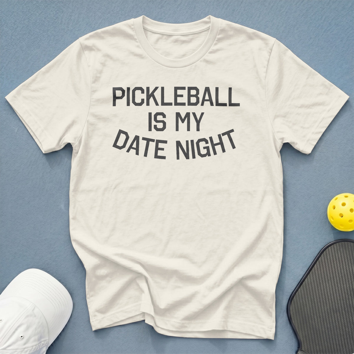 Cream t-shirt with "PICKLEBALL IS MY DATE NIGHT" text.