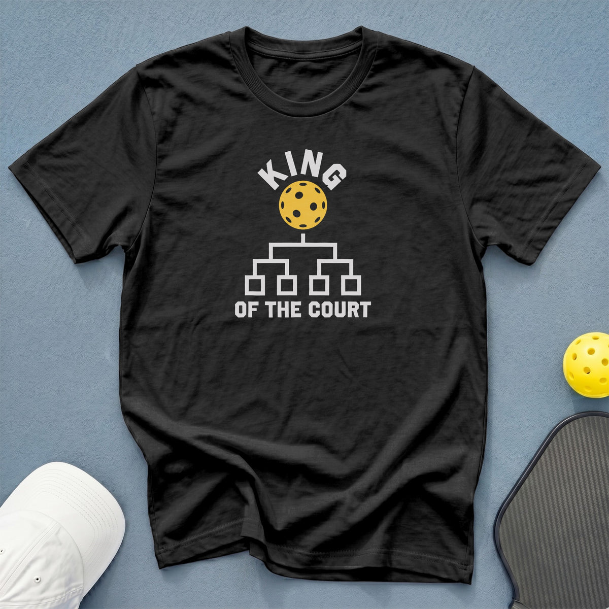 Black t-shirt with "King Of The Court" pickleball graphic.