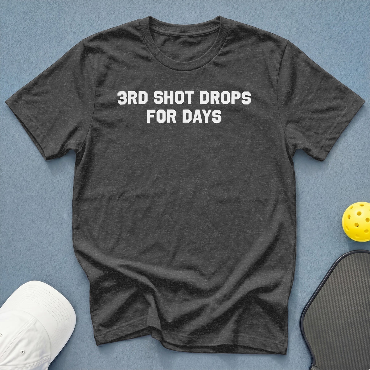 Dark gray t-shirt with white text "3RD SHOT DROPS FOR DAYS."
