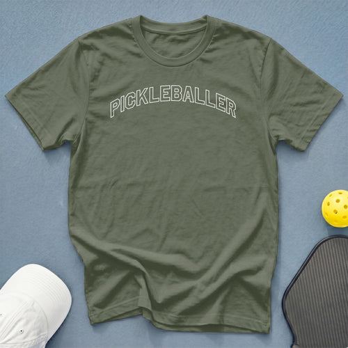 Olive green t-shirt with white "PICKLEBALLER" text, pickleball, and paddle.