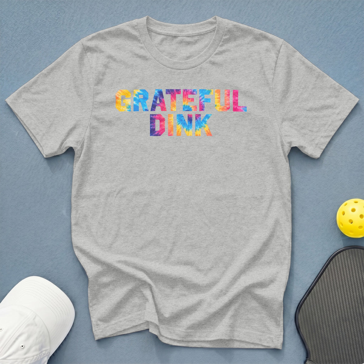 Gray t-shirt with tie-dye text "GRATEFUL DINK".