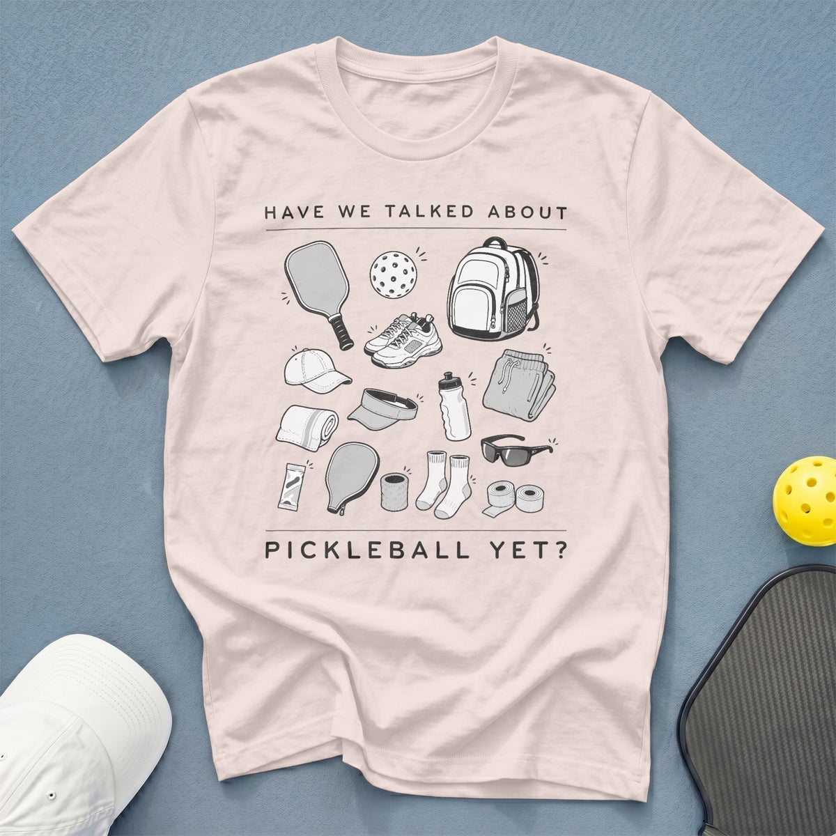T-shirt with "HAVE WE TALKED ABOUT PICKLEBALL YET?" and pickleball gear illustrations.
