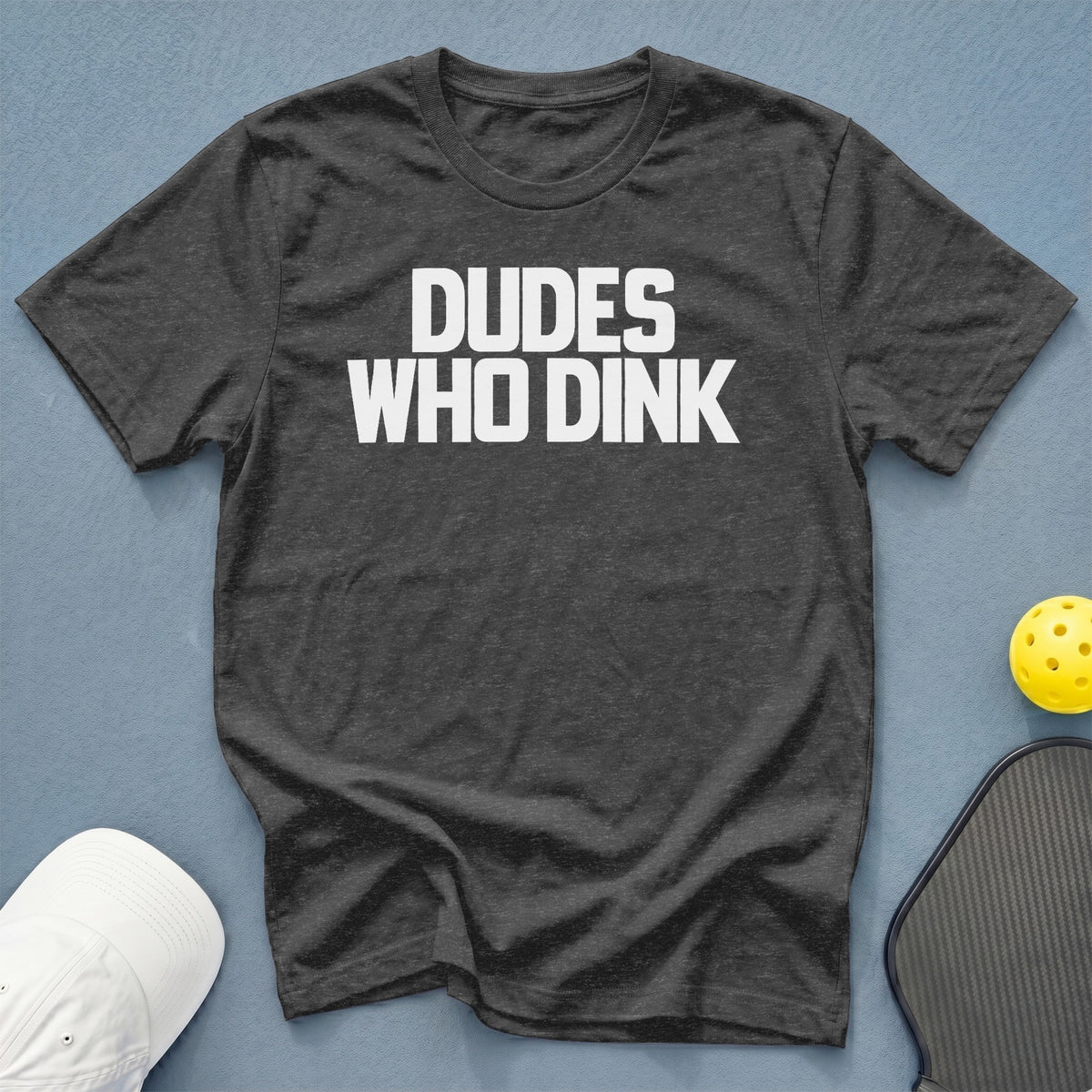 Dark grey t-shirt with "DUDE'S WHO DINK" text, pickleball paddle, and ball.